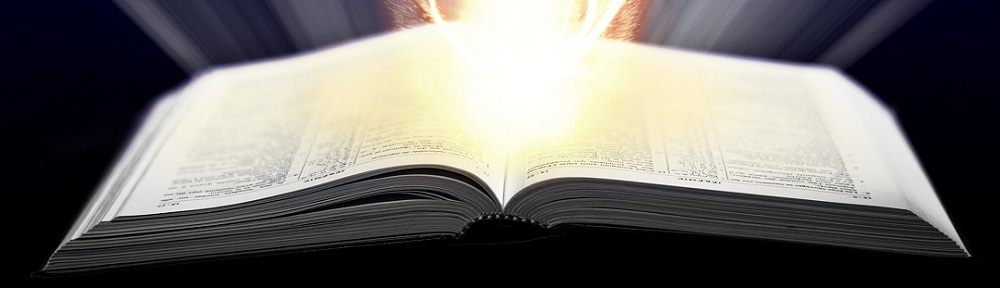 Open Bible with an orange flame above its pages